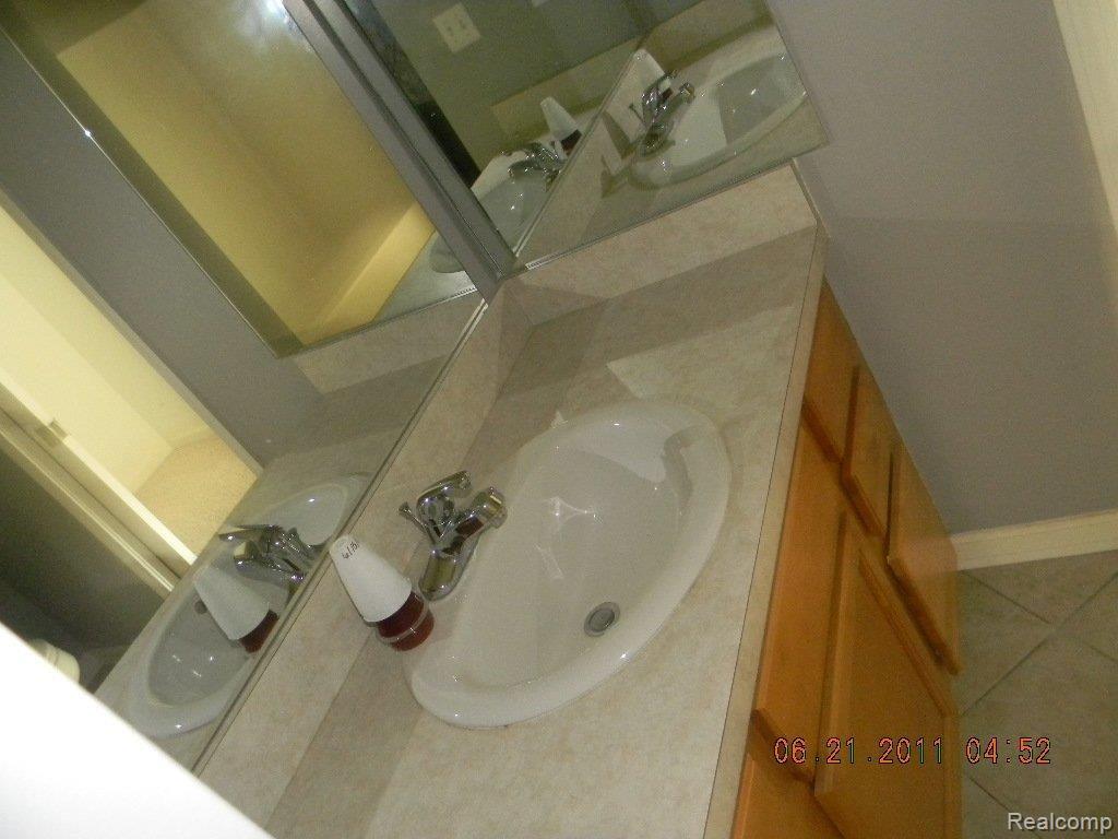 2425 Pleasant Ridge Howell, MI 48843 - Photo 9 of 13 main bath Vanity