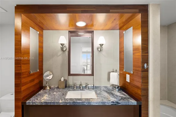 a view of a hallway with washer and dryer