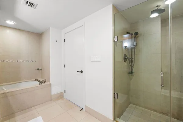 a view of entryway with washer and dryer