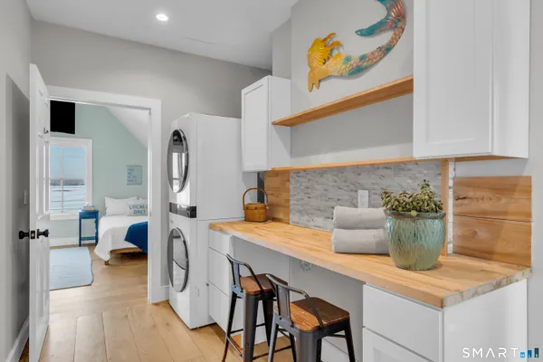 a kitchen with a table and chairs