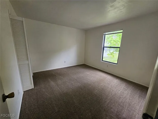 an empty room with closet