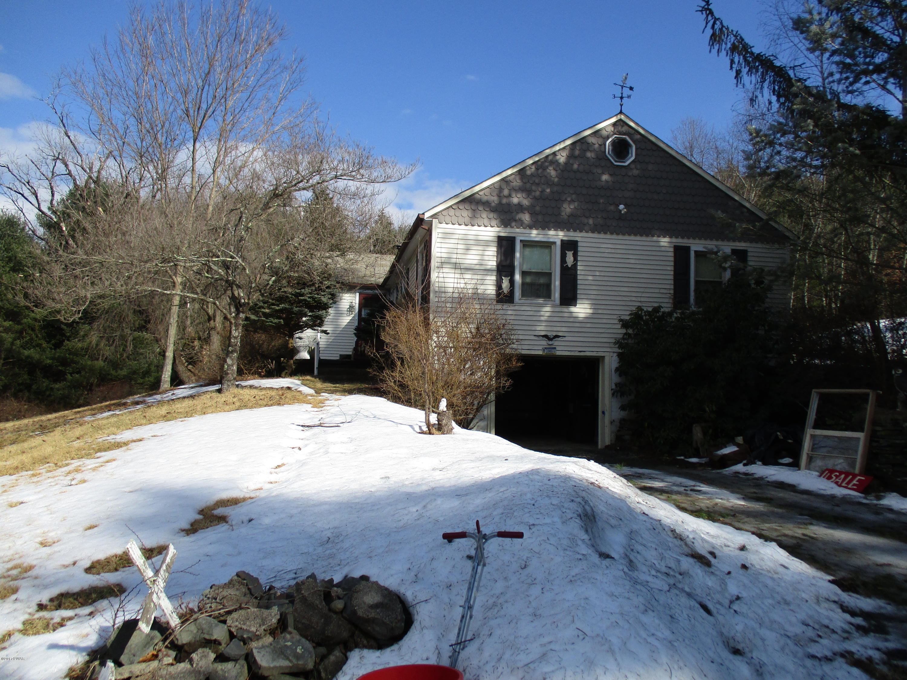 142 Log Tavern Road Milford, PA 18337 - Photo 22 of 24 a front view of a house with a yard