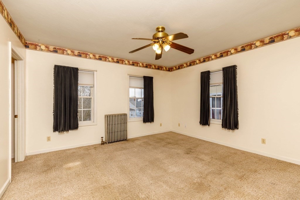 42 Prospect Street Athol, MA 01331 - Photo 12 of 20 a view of an empty room with a window