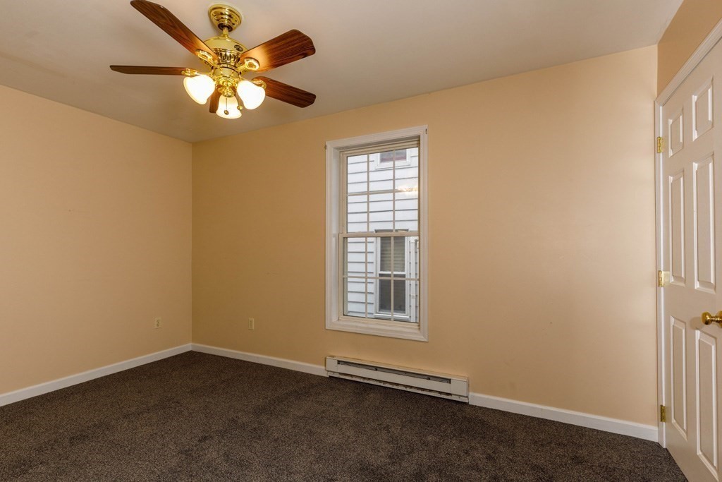 42 Prospect Street Athol, MA 01331 - Photo 15 of 20 an empty room with windows and fan