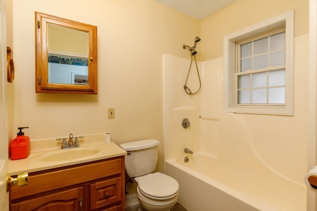 42 Prospect Street Athol, MA 01331 - Photo 16 of 20 a bathroom with a sink a toilet and shower
