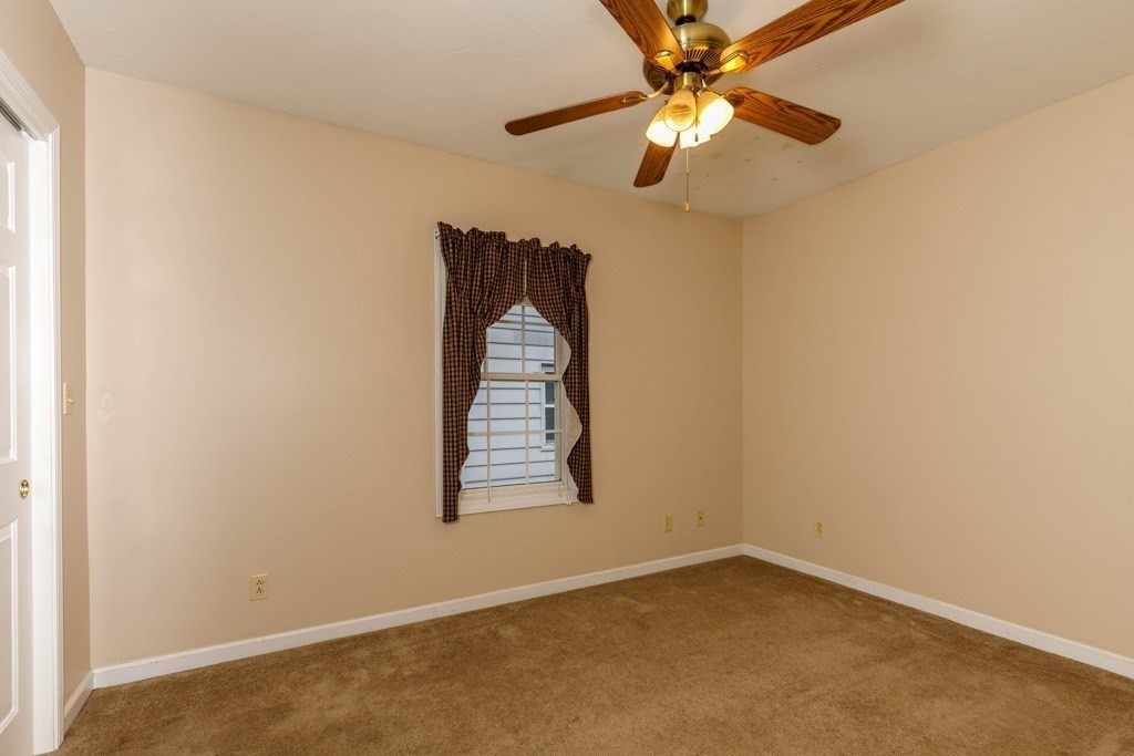 42 Prospect Street Athol, MA 01331 - Photo 7 of 20 an empty room with windows and fan