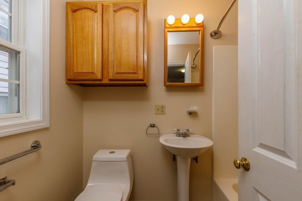 42 Prospect Street Athol, MA 01331 - Photo 8 of 20 a bathroom with a sink and a mirror