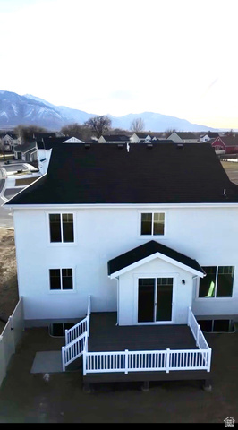 1142 West 220 North Mapleton, UT 84664 - Photo 21 of 26 View of back of property featuring stucco siding and a deck with mountain view