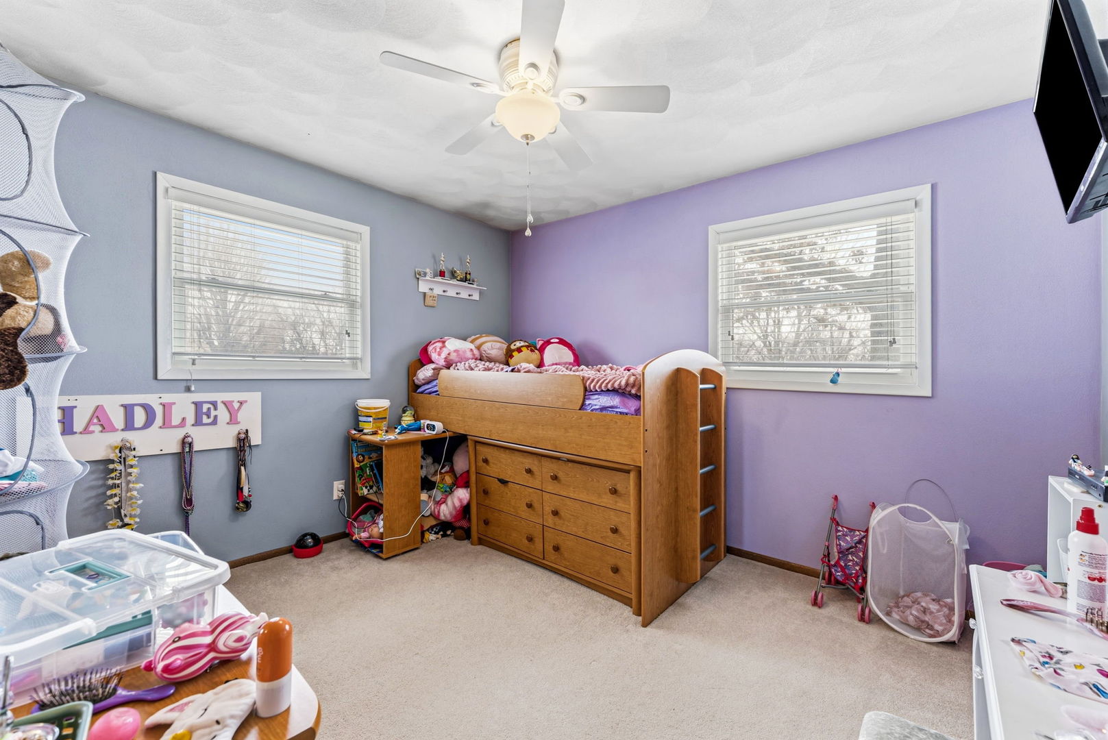 404 Southwest 10th Street Aledo, IL 61231 - Photo 14 of 27 a bedroom with a bed and a chandelier