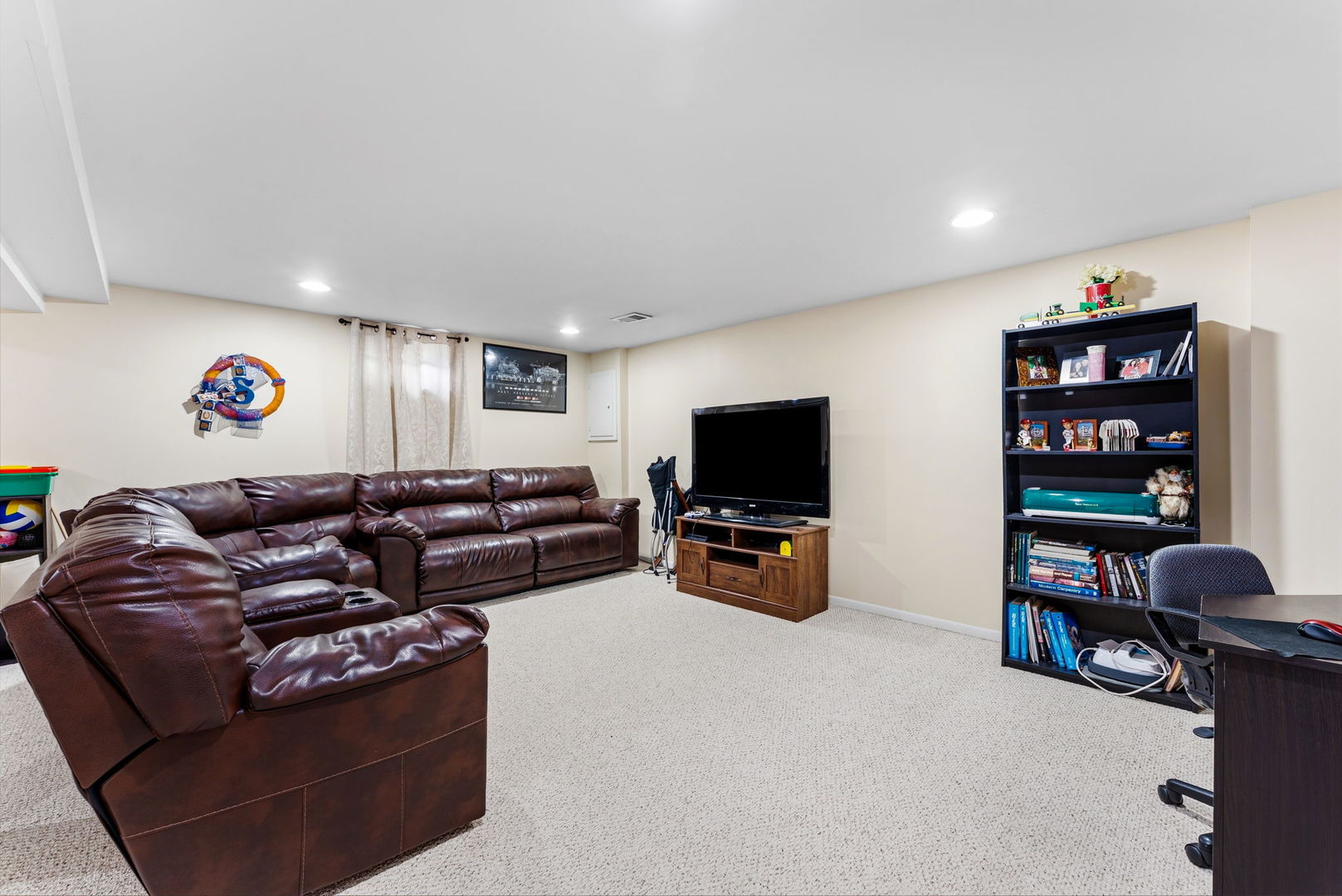 404 Southwest 10th Street Aledo, IL 61231 - Photo 20 of 27 a living room with furniture and a flat screen tv