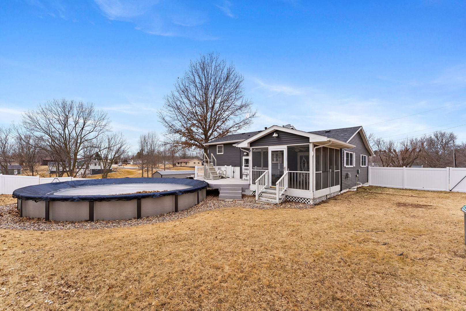 404 Southwest 10th Street Aledo, IL 61231 - Photo 23 of 27 a view of a house with yard and entertaining space