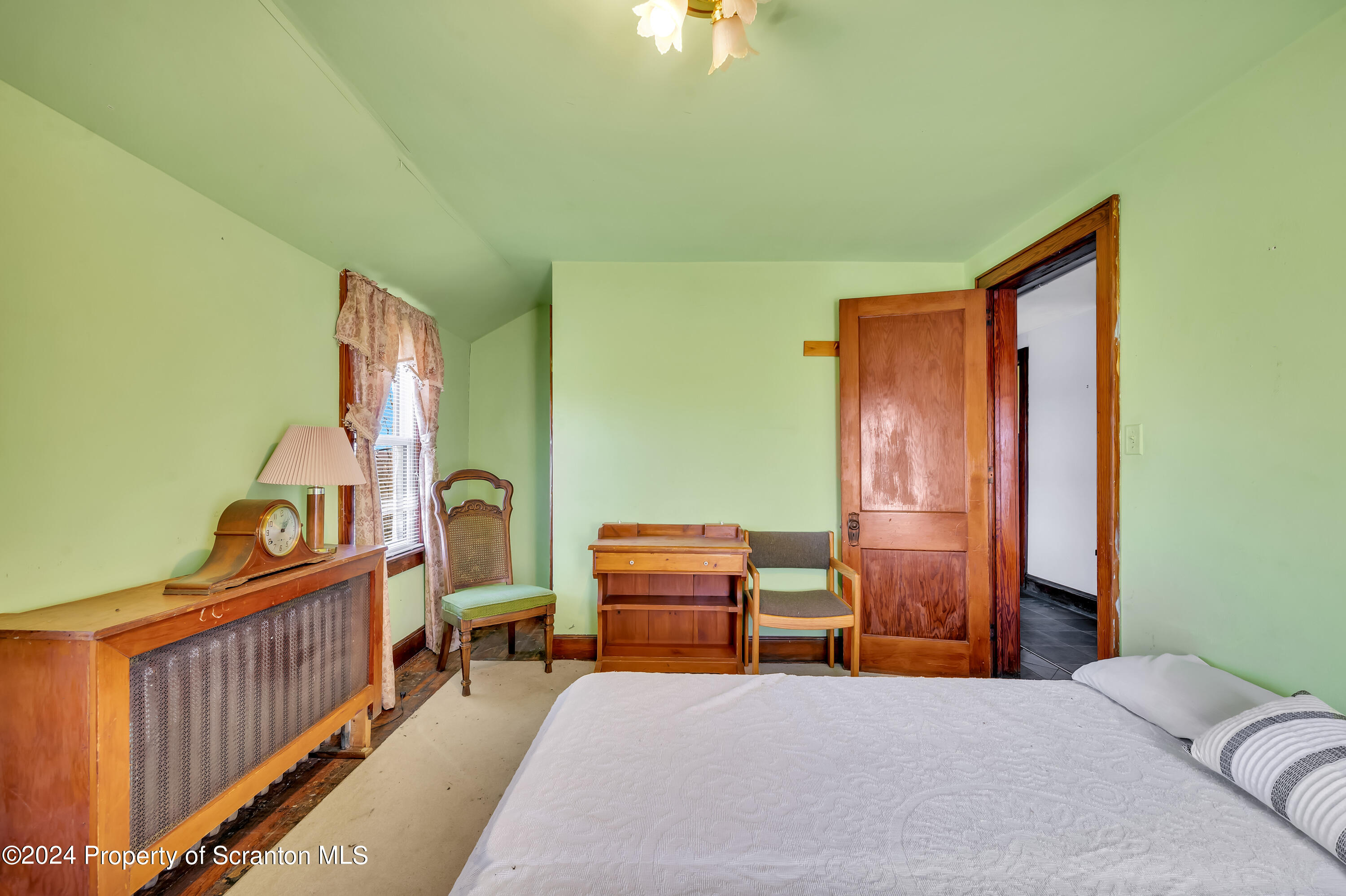 1128 County Home Road Montrose, PA 18801 - Photo 46 of 68 a bedroom with furniture and baby crib