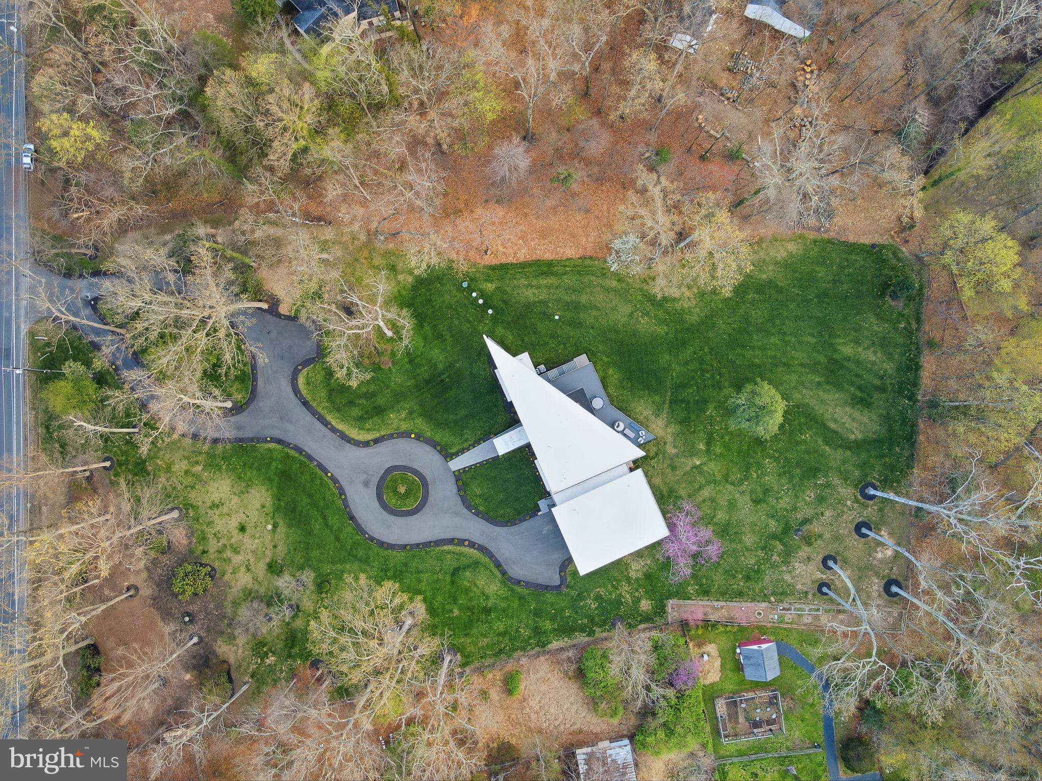 2368 Hunter Mill Road Vienna, VA 22181 - Photo 1 of 74 an aerial view of a house with a yard