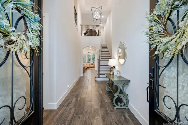 a view of entryway with wooden floor