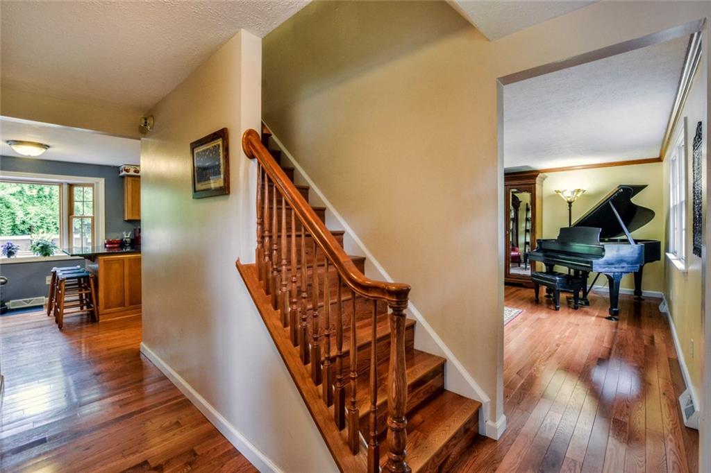 2075 Redcoach Road Allison Park, PA 15101 - Photo 2 of 25 Greet guests into the foyer that offers beautiful hardwood flooring which continues throughout the main level.