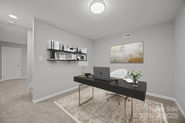 a living room with furniture and furniture