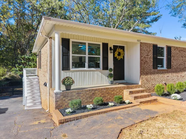 front view of a house with a small yard
