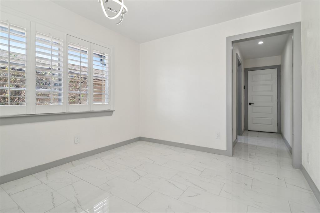 2325 Regal Road Plano, TX 75075 - Photo 16 of 34 a view of an empty room with a window