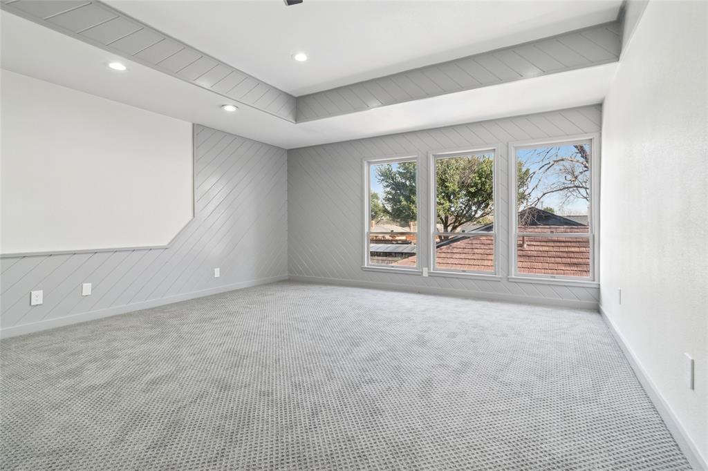2325 Regal Road Plano, TX 75075 - Photo 19 of 34 an empty room with windows and mountain view