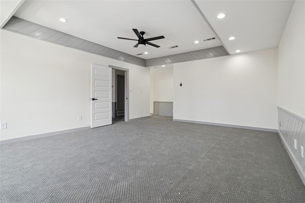 2325 Regal Road Plano, TX 75075 - Photo 20 of 34 an empty room with ceiling fan and window