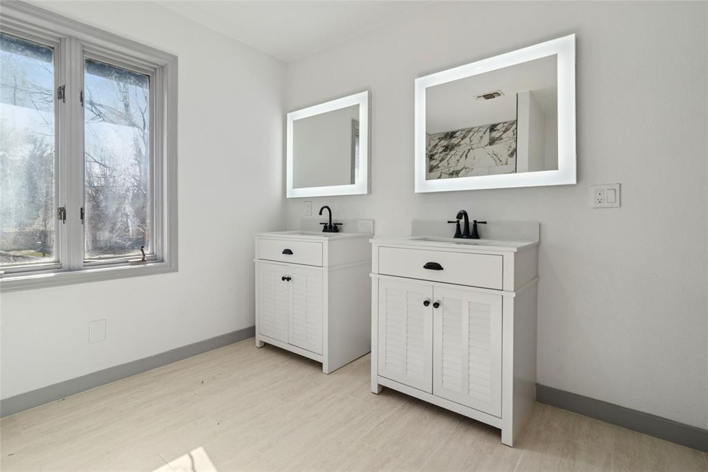 2325 Regal Road Plano, TX 75075 - Photo 22 of 34 a view of room with window and bathroom