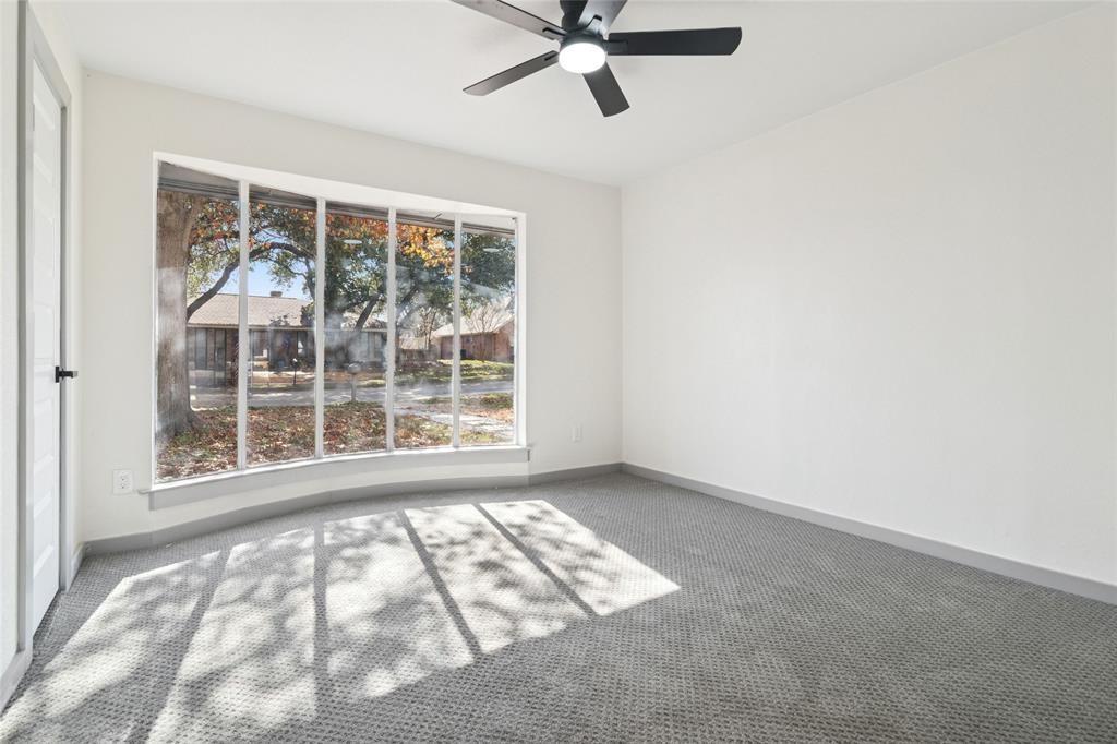 2325 Regal Road Plano, TX 75075 - Photo 23 of 34 a view of an empty room with a window