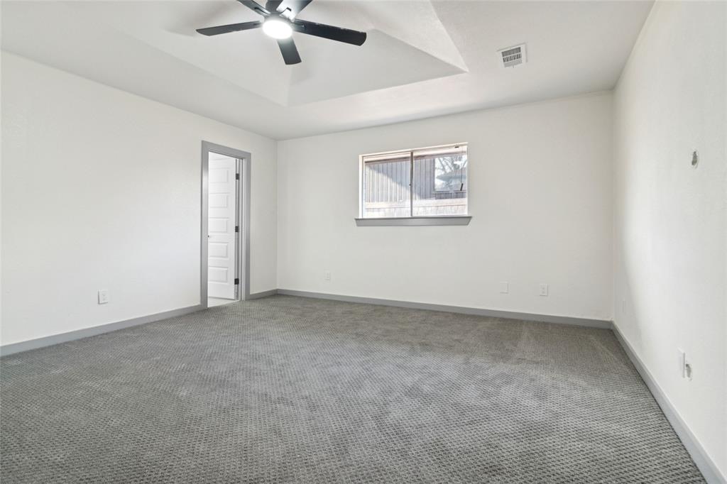 2325 Regal Road Plano, TX 75075 - Photo 28 of 34 a view of an empty room with a window