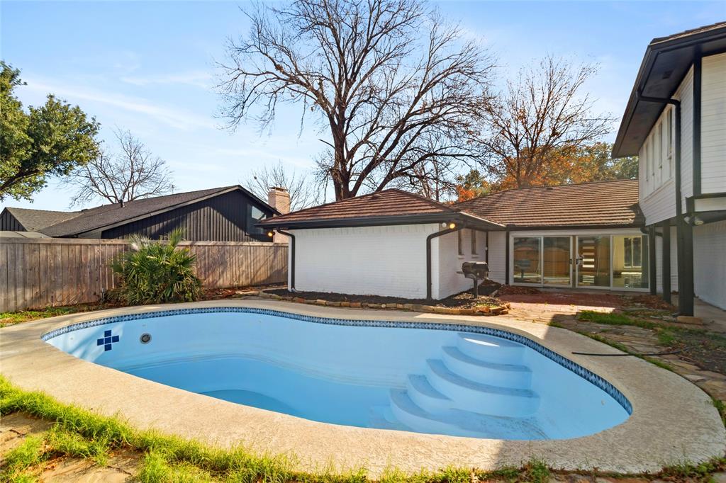 2325 Regal Road Plano, TX 75075 - Photo 33 of 34 a front view of a house with yard