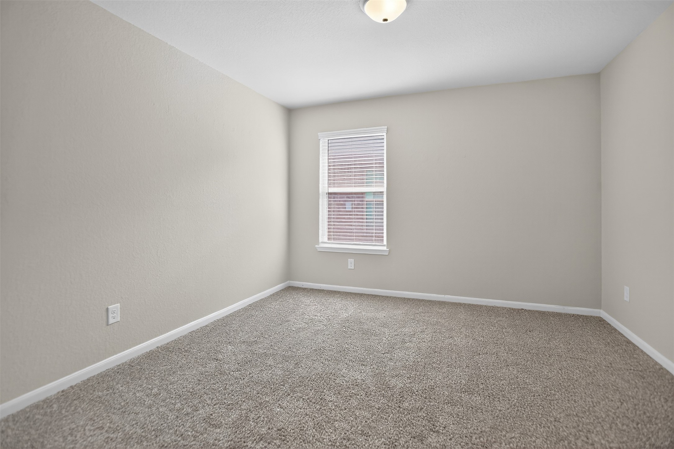 3310 Sumac Drive Katy, TX 77494 - Photo 25 of 45 an empty room with a window
