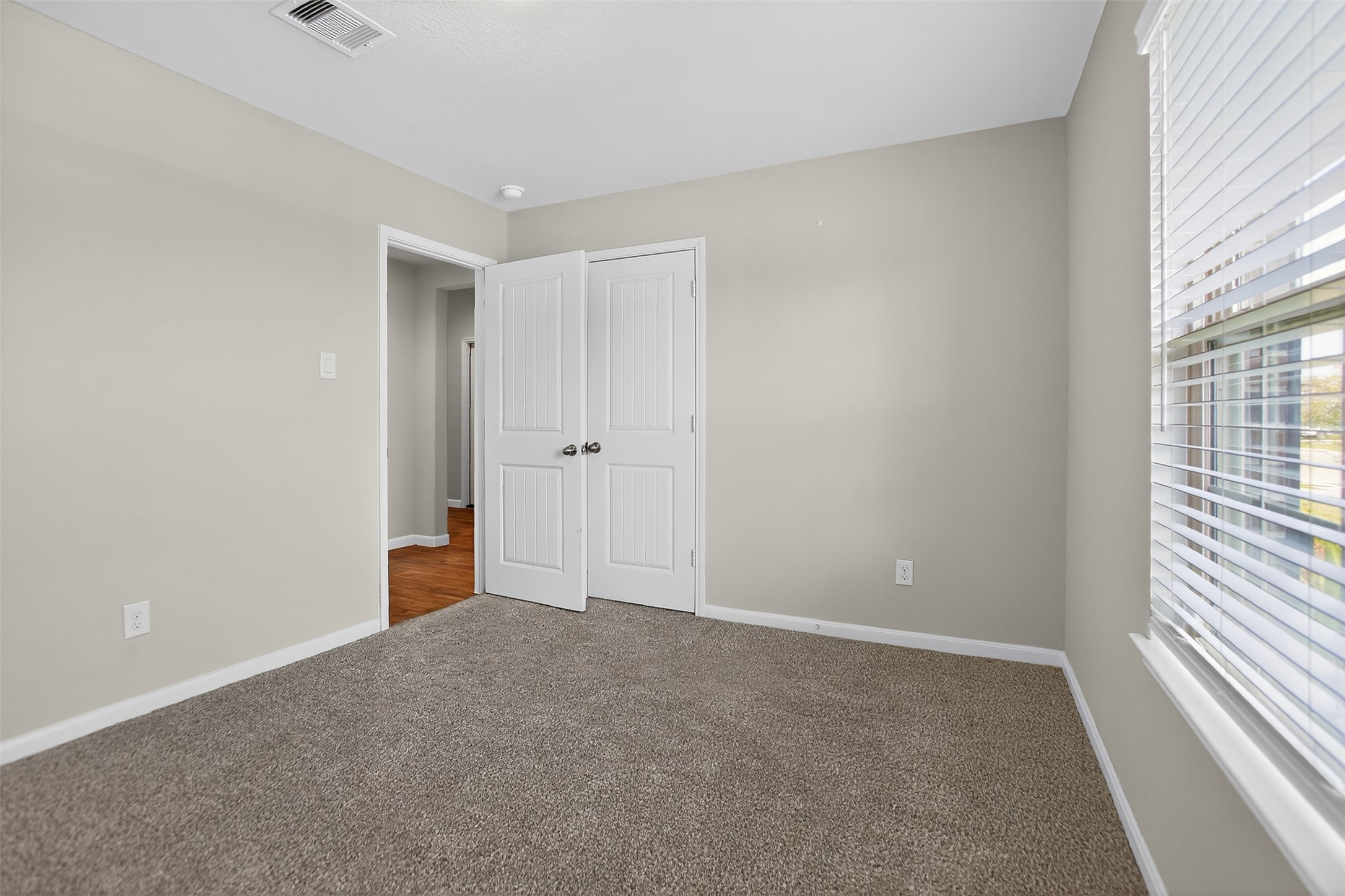 3310 Sumac Drive Katy, TX 77494 - Photo 27 of 45 a view of an empty room with a window