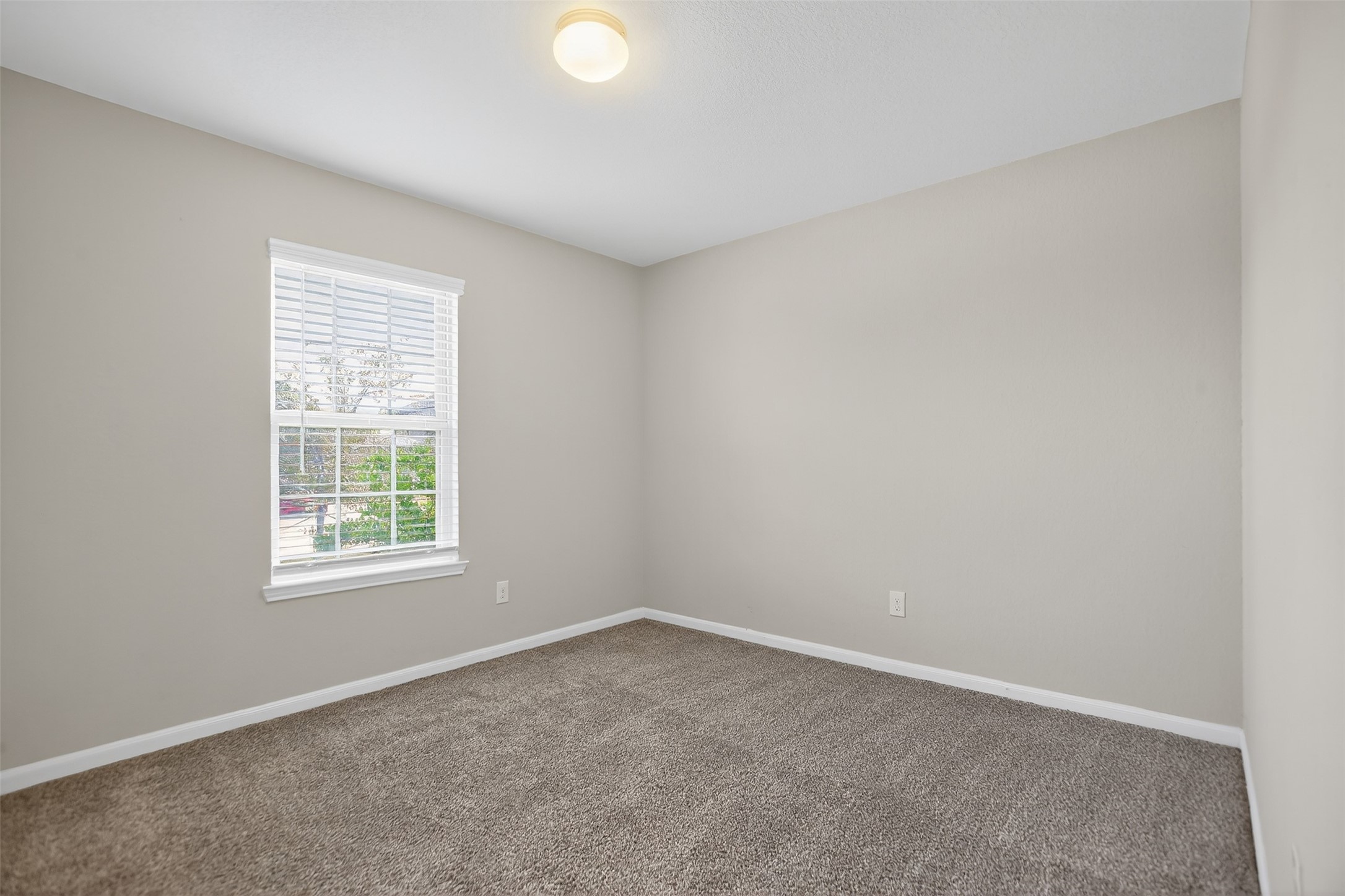 3310 Sumac Drive Katy, TX 77494 - Photo 29 of 45 an empty room with a window