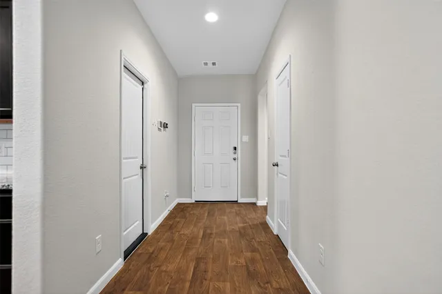 a view of small space with wooden floor