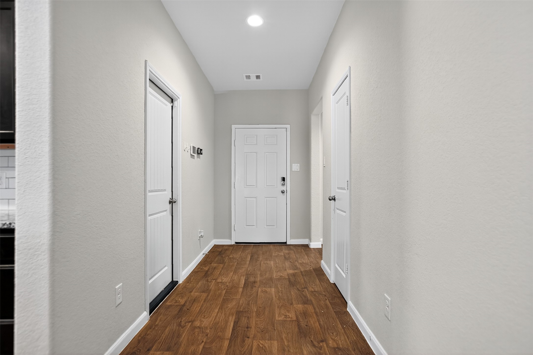 3310 Sumac Drive Katy, TX 77494 - Photo 33 of 45 a view of a hallway with wooden floor