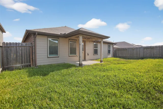 a house view with a garden space