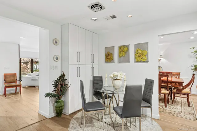 a view of a livingroom with furniture and lounge chair