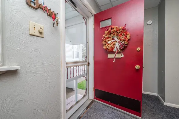 a view of an entryway with sitting area