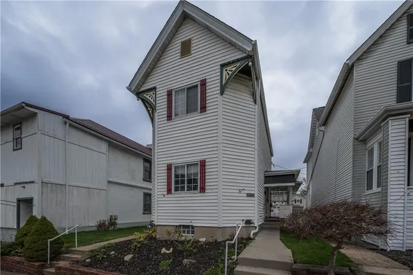 a view of a house with a garage