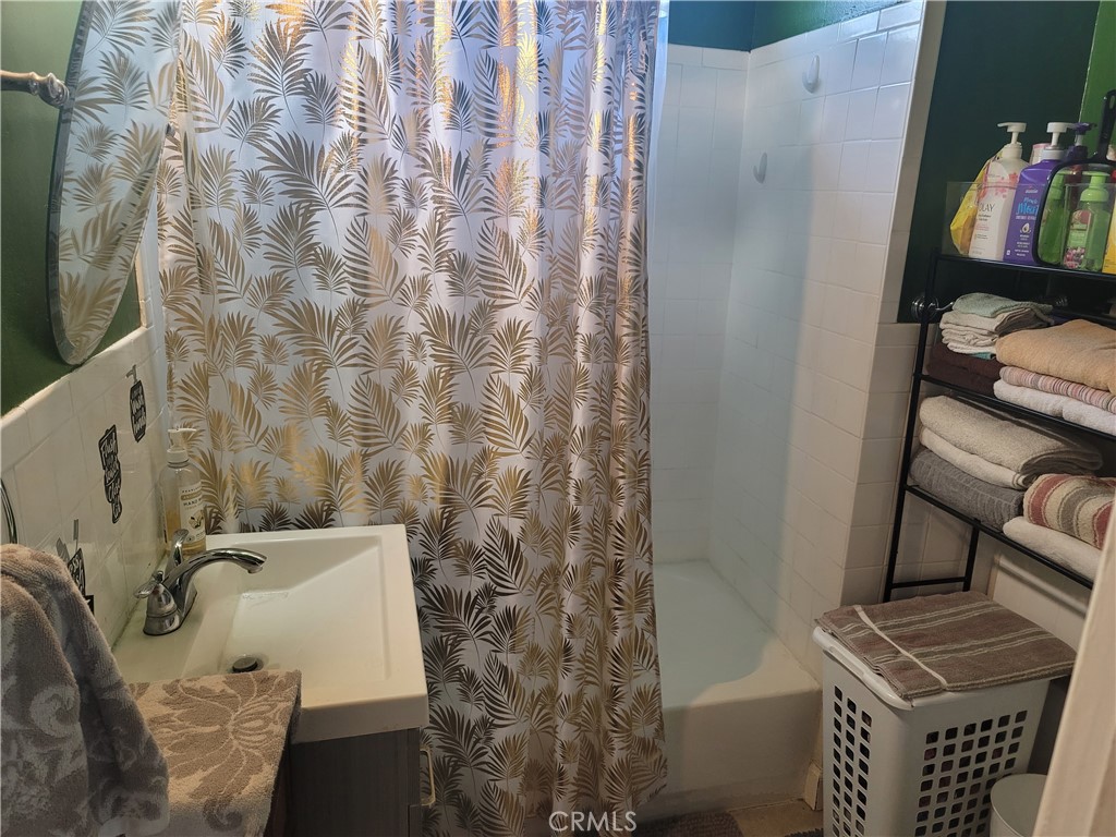 1408 South Burris Avenue Compton, CA 90221 - Photo 17 of 29 a bathroom with a sink and toilet