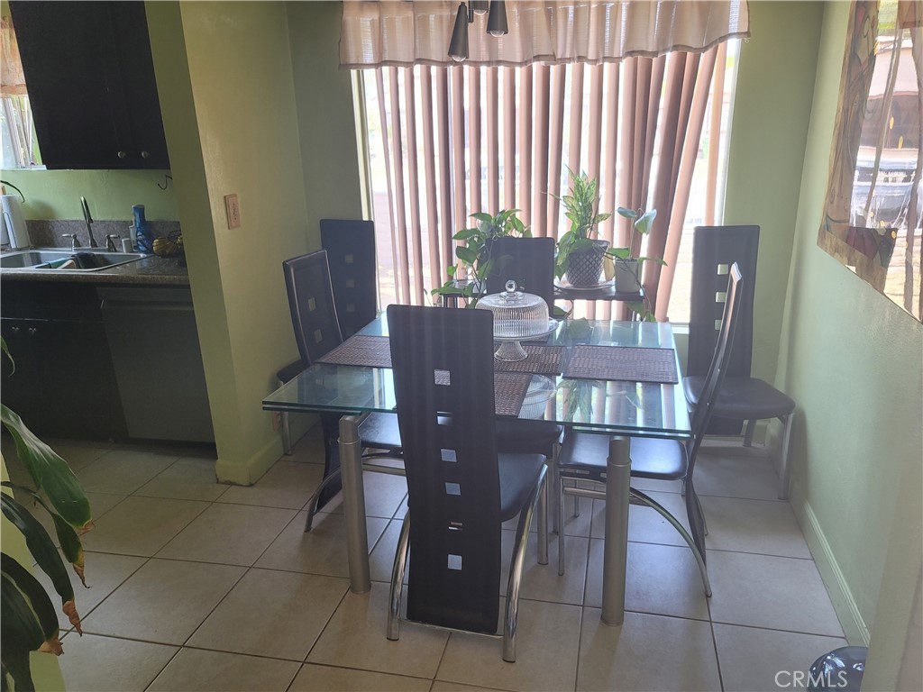 1408 South Burris Avenue Compton, CA 90221 - Photo 23 of 29 a view of a dining room with furniture and window