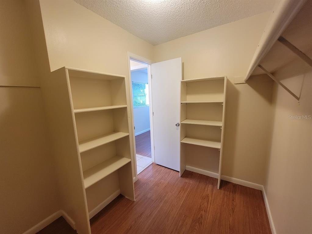 23358 Racine Avenue Punta Gorda, FL 33980 - Photo 14 of 28 a view of walk in closet with empty racks