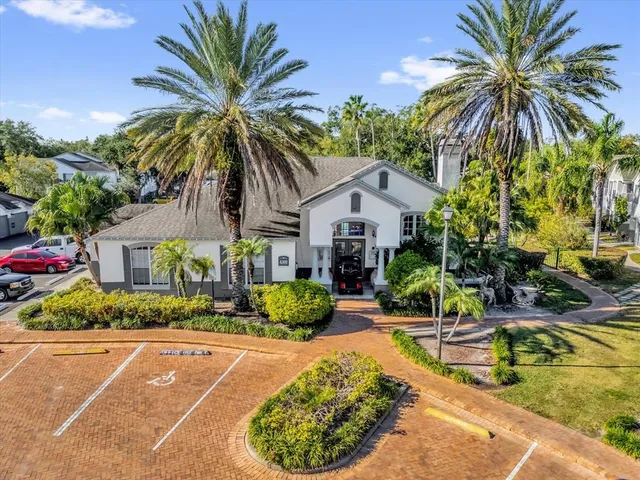 a house with a swimming pool and porch