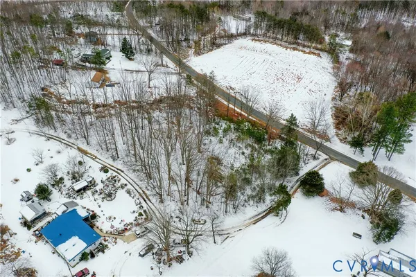 a view of swimming pool with a yard