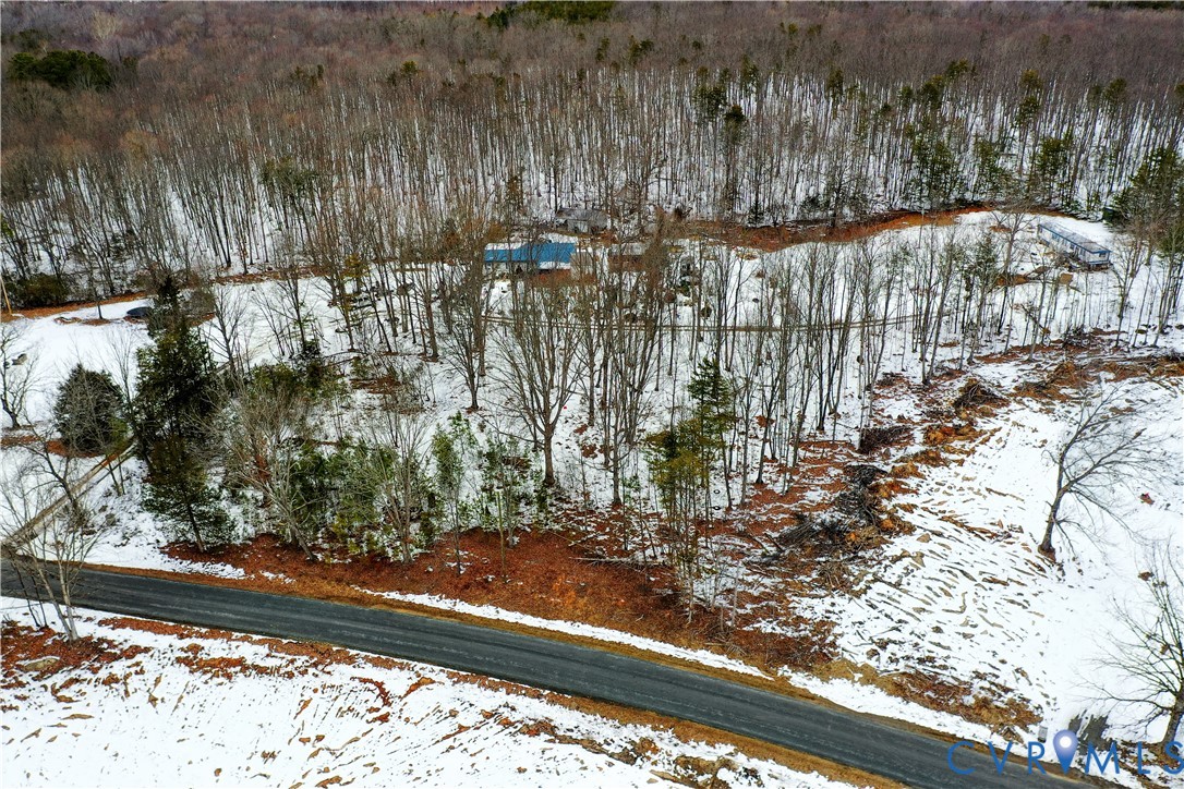 4890 Harris Creek Road Prospect, VA 23960 - Photo 12 of 22 a view of a yard with plants and wooden fence