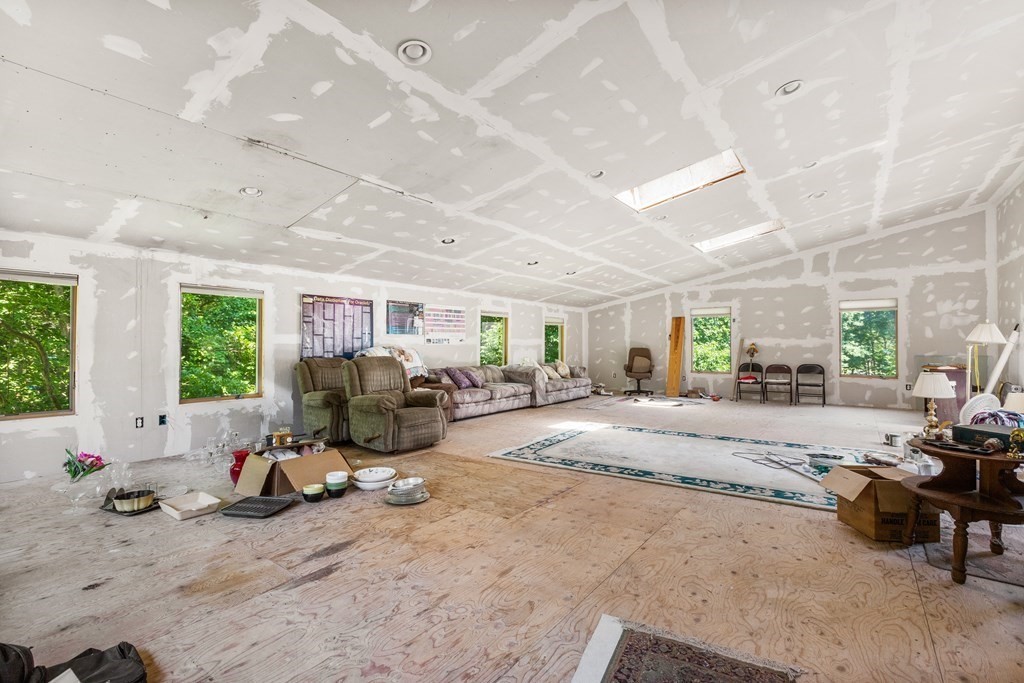 96 Fowler Road Northbridge, MA 01534 - Photo 11 of 28 a view of a livingroom with furniture and a large window