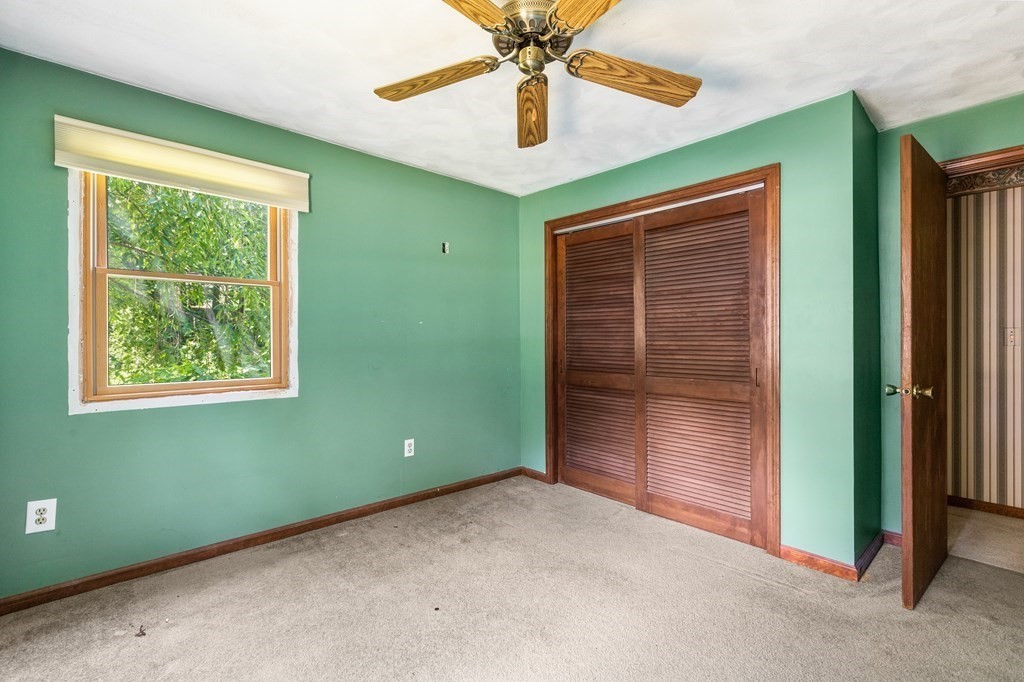 96 Fowler Road Northbridge, MA 01534 - Photo 15 of 28 an empty room with closet and windows