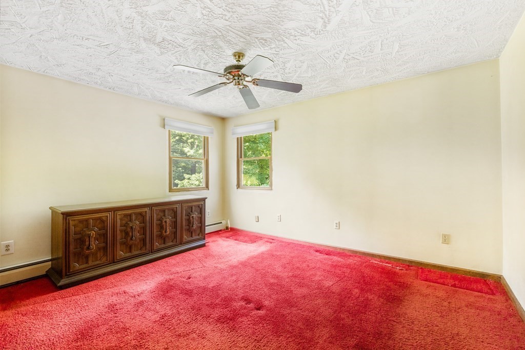 96 Fowler Road Northbridge, MA 01534 - Photo 17 of 28 an empty room with windows