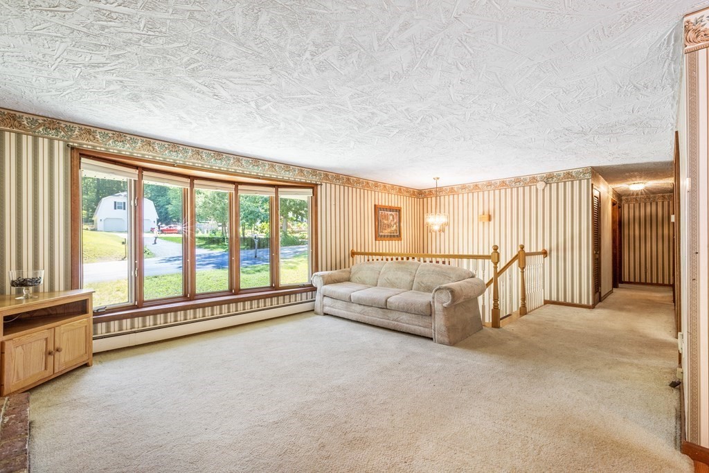 96 Fowler Road Northbridge, MA 01534 - Photo 4 of 28 a living room with furniture and a large window