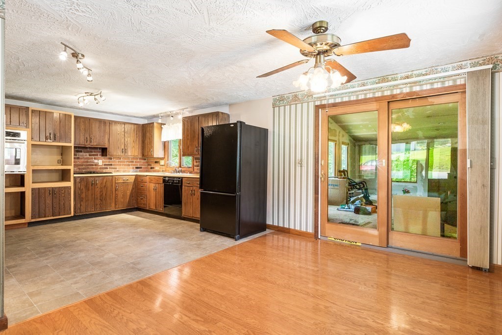 96 Fowler Road Northbridge, MA 01534 - Photo 5 of 28 a kitchen with stainless steel appliances granite countertop a refrigerator and a sink