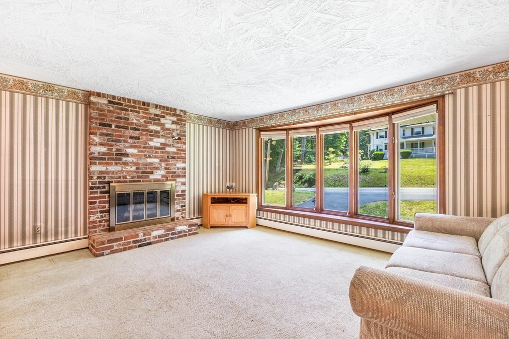 96 Fowler Road Northbridge, MA 01534 - Photo 9 of 28 a living room with furniture and large windows