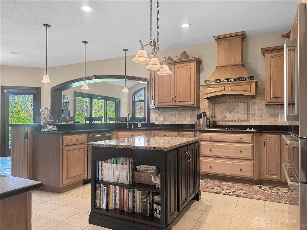 4096 Middle Urbana Road Urbana, OH 43078 - Photo 86 of 96 This spacious kitchen offers a central island, elegant granite counters, and ample cabinetry.
